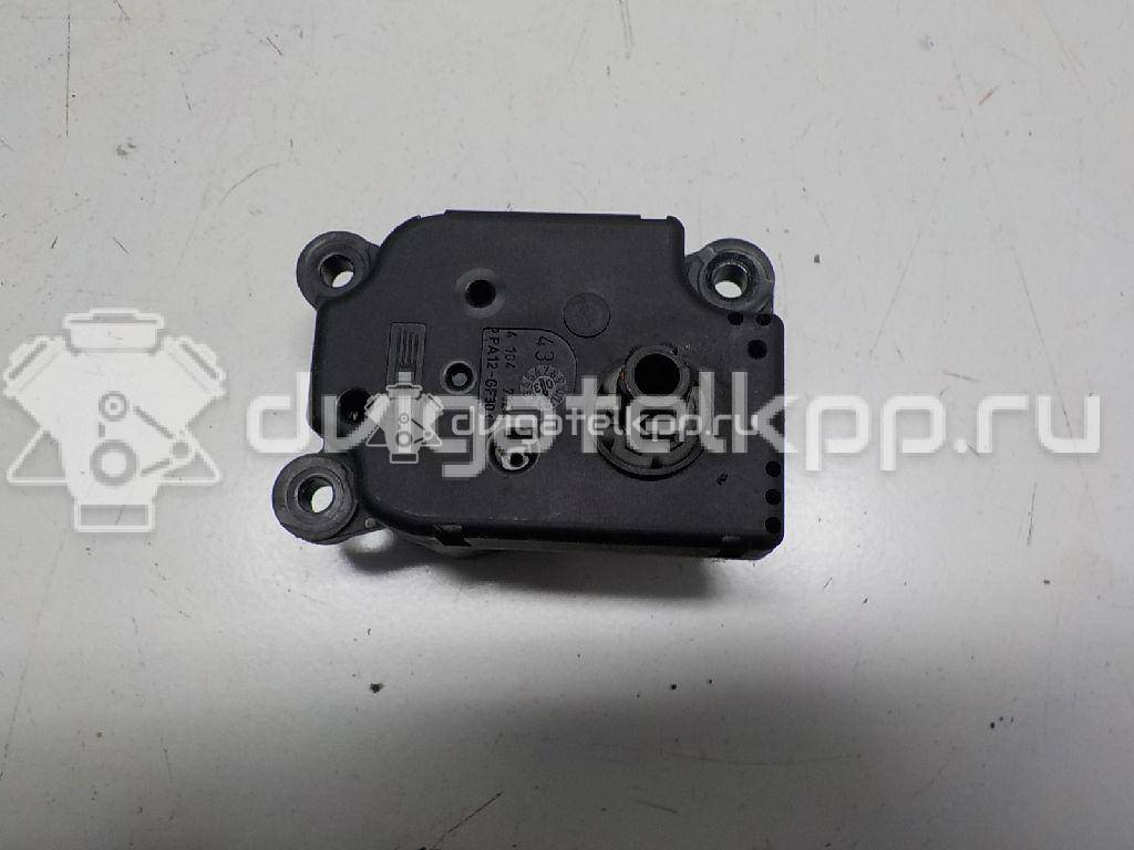 Фото Моторчик заслонки отопителя  1S7H19E616AA для Ford Focus / Mondeo {forloop.counter}}