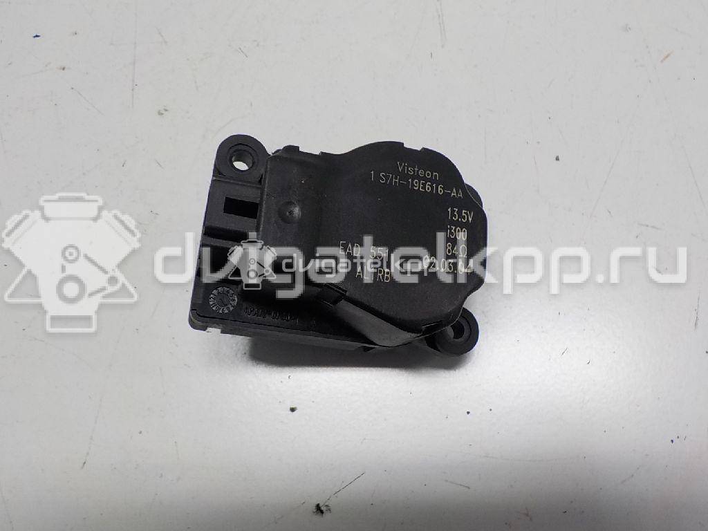 Фото Моторчик заслонки отопителя  1S7H19E616AA для Ford Focus / Mondeo {forloop.counter}}