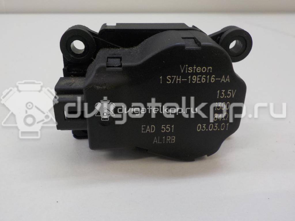 Фото Моторчик заслонки отопителя  1S7H19E616AA для Ford Focus / Mondeo {forloop.counter}}