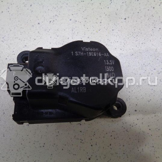 Фото Моторчик заслонки отопителя  1S7H19E616AA для Ford Focus / Mondeo