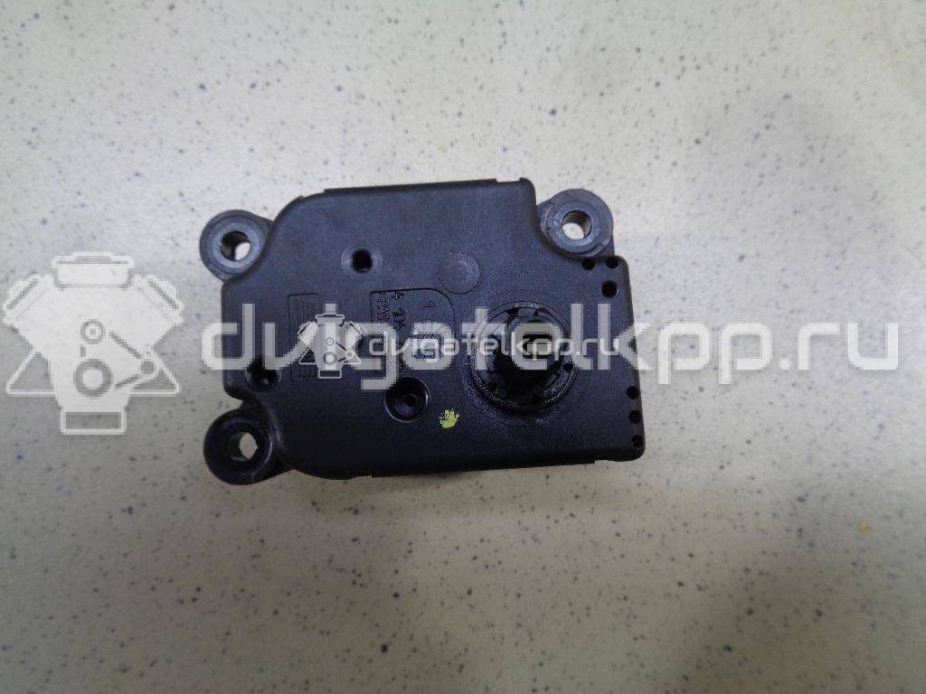 Фото Моторчик заслонки отопителя  1S7H19E616AA для Ford Focus / Mondeo {forloop.counter}}