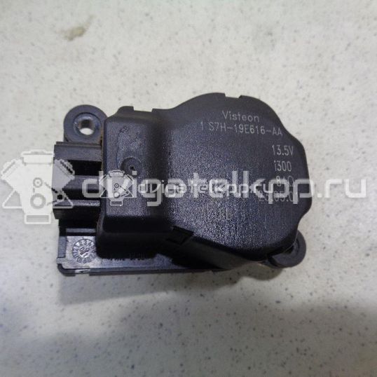 Фото Моторчик заслонки отопителя  1S7H19E616AA для Ford Focus / Mondeo