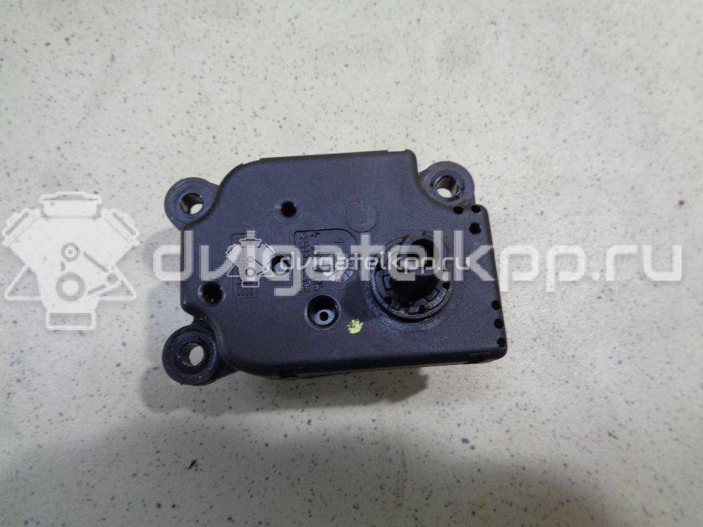 Фото Моторчик заслонки отопителя  1S7H19E616AA для Ford Focus / Mondeo {forloop.counter}}