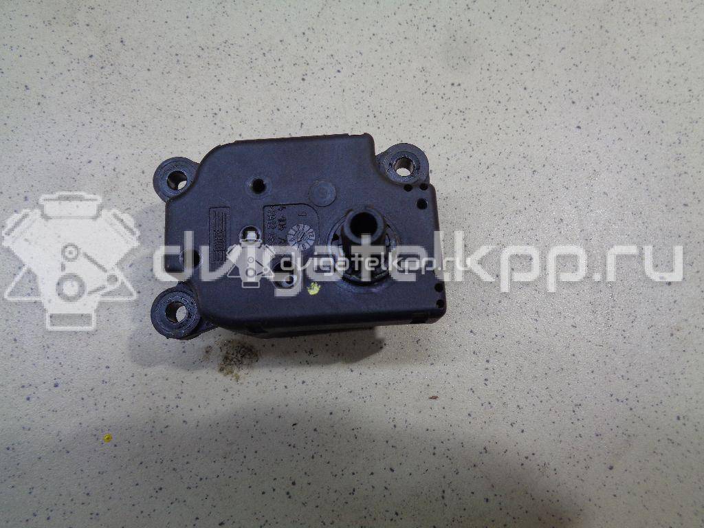 Фото Моторчик заслонки отопителя  1S7H19E616AA для Ford Focus / Mondeo {forloop.counter}}