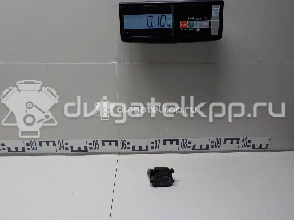 Фото Моторчик заслонки отопителя  1S7H19E616AA для Ford Focus / Mondeo {forloop.counter}}