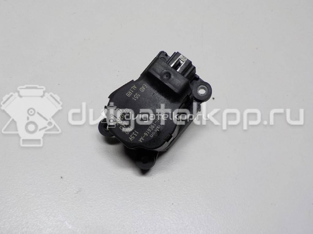 Фото Моторчик заслонки отопителя  1S7H19E616AA для Ford Focus / Mondeo {forloop.counter}}
