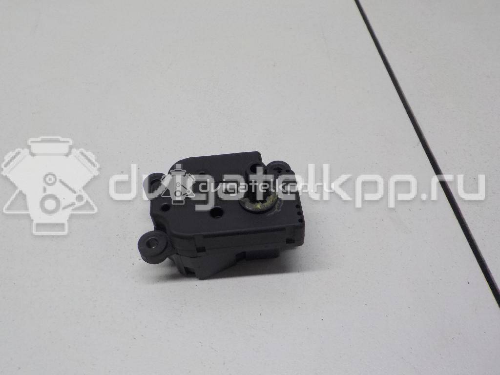 Фото Моторчик заслонки отопителя  1S7H19E616AA для Ford Focus / Mondeo {forloop.counter}}