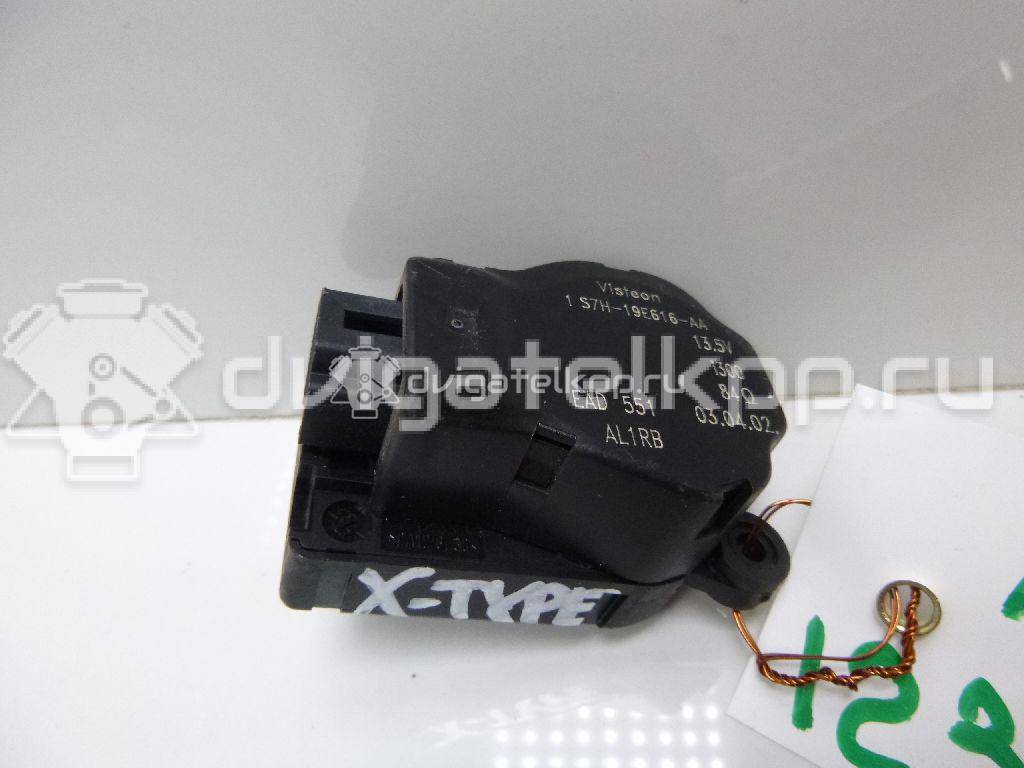 Фото Моторчик заслонки отопителя  1S7H19E616AA для Ford Focus / Mondeo {forloop.counter}}