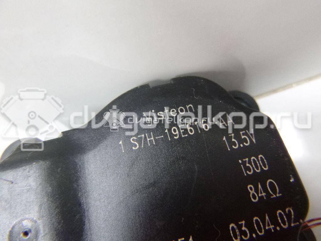 Фото Моторчик заслонки отопителя  1S7H19E616AA для Ford Focus / Mondeo {forloop.counter}}