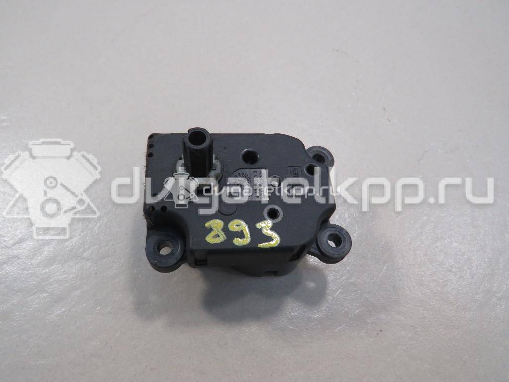 Фото Моторчик заслонки отопителя  1S7H19E616AA для Ford Focus / Mondeo {forloop.counter}}