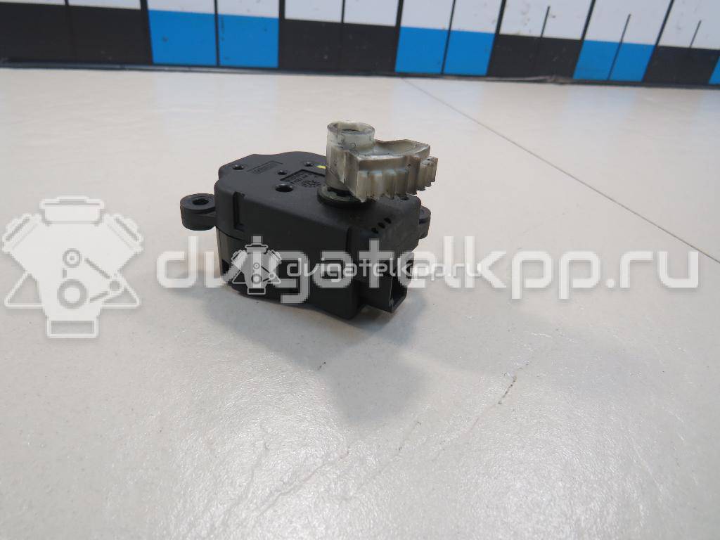 Фото Моторчик заслонки отопителя  1S7H19E616AA для Ford Focus / Mondeo {forloop.counter}}