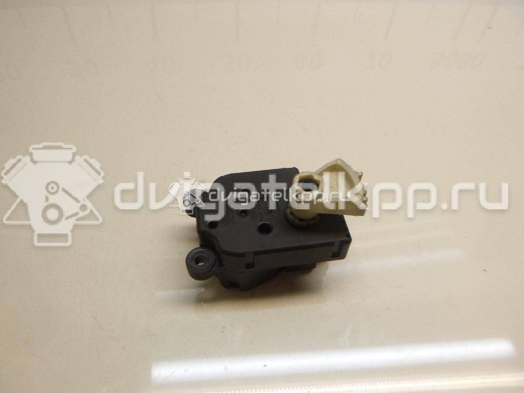 Фото Моторчик заслонки отопителя  1S7H19E616AA для Ford Focus / Mondeo {forloop.counter}}