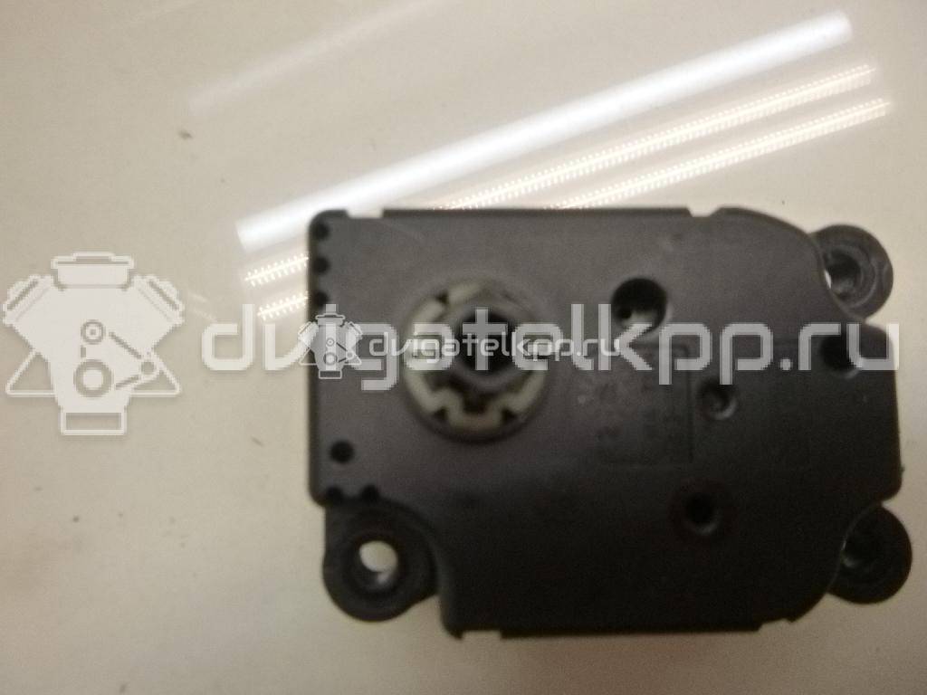 Фото Моторчик заслонки отопителя  1S7H19E616AA для Ford Focus / Mondeo {forloop.counter}}