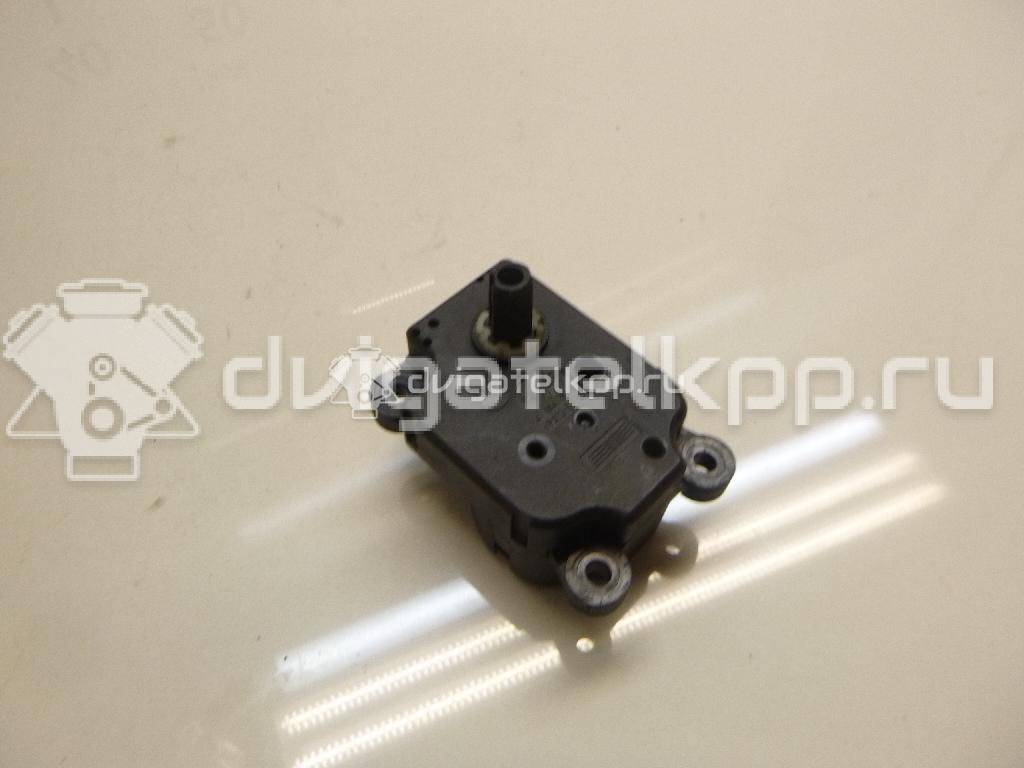 Фото Моторчик заслонки отопителя  1S7H19E616AA для Ford Focus / Mondeo {forloop.counter}}