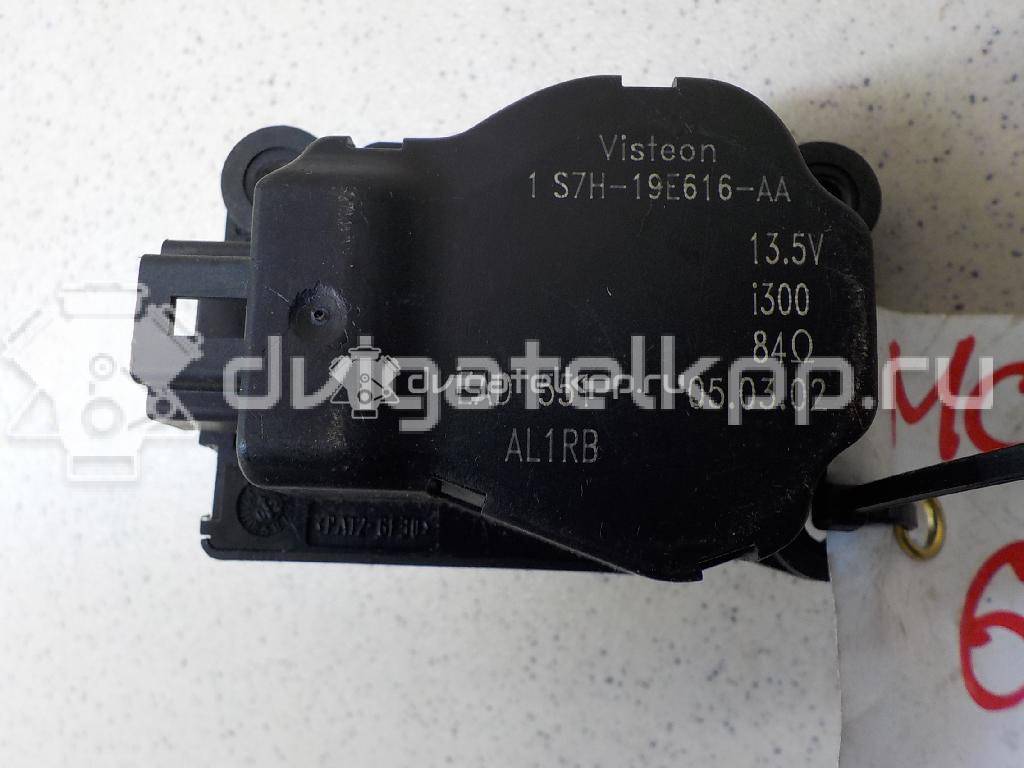 Фото Моторчик заслонки отопителя  1S7H19E616AA для Ford Focus / Mondeo {forloop.counter}}