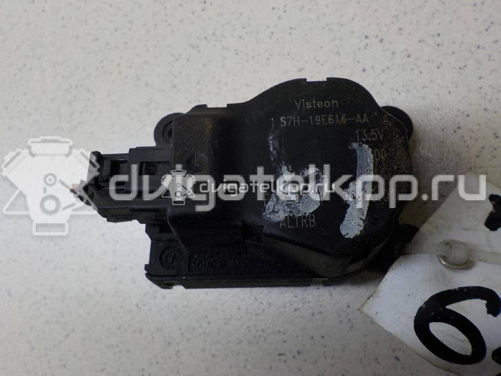 Фото Моторчик заслонки отопителя  1S7H19E616AA для Ford Focus / Mondeo {forloop.counter}}