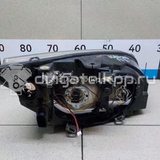 Фото Фара левая  1480990 для Ford Focus