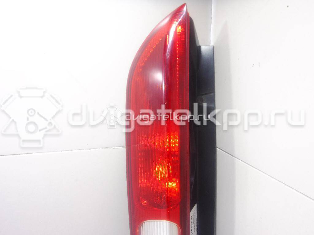Фото Фонарь задний правый  1420450 для Ford Focus {forloop.counter}}