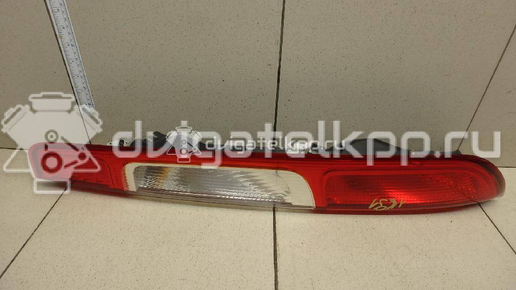 Фото Фонарь задний правый  1420450 для Ford Focus {forloop.counter}}