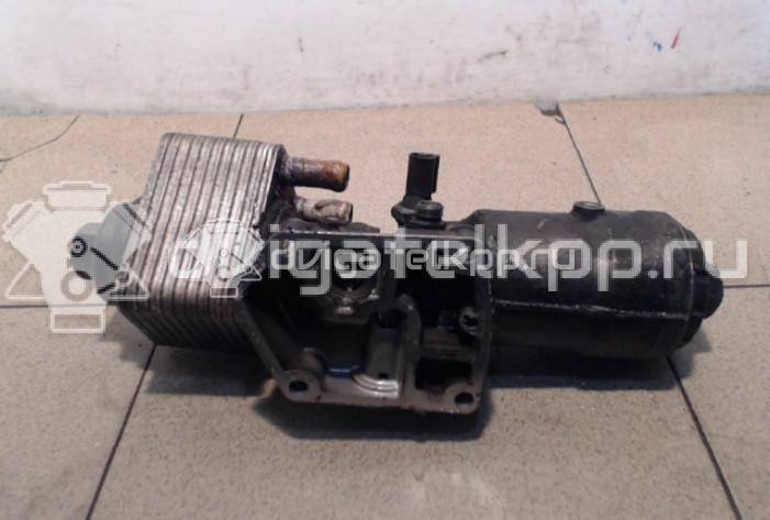 Фото Кронштейн масляного фильтра для двигателя BSY для Mitsubishi Outlander / Grandis Na W 136-140 л.с 16V 2.0 л Дизельное топливо MN980122 {forloop.counter}}