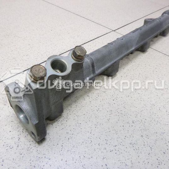 Фото Рейка топливная (рампа) для двигателя 4D56 (16V) для Mitsubishi Pajero / L 110-178 л.с 16V 2.5 л Дизельное топливо MD329931