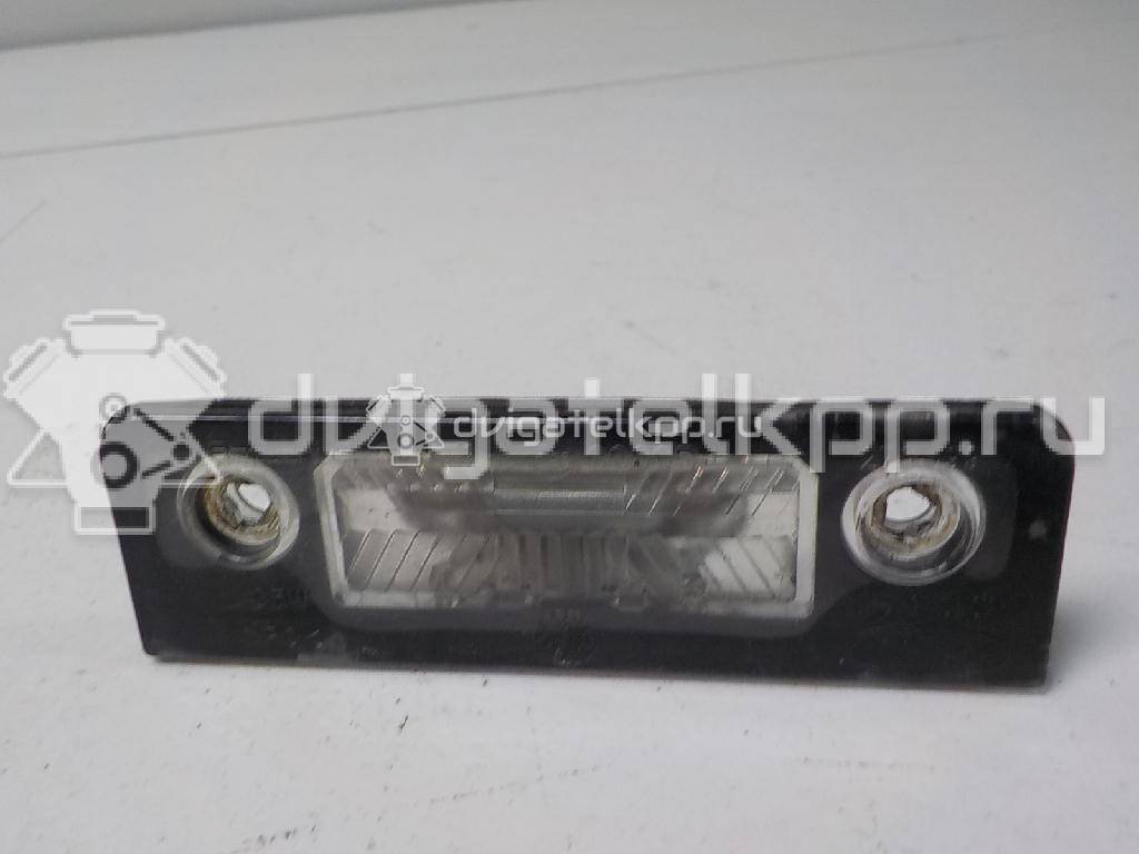 Фото Фонарь подсветки номера  1114328 для Ford Galaxy {forloop.counter}}