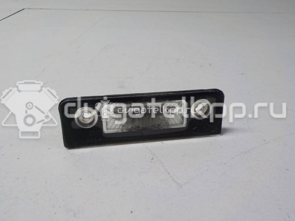 Фото Фонарь подсветки номера  1114328 для Ford Galaxy {forloop.counter}}