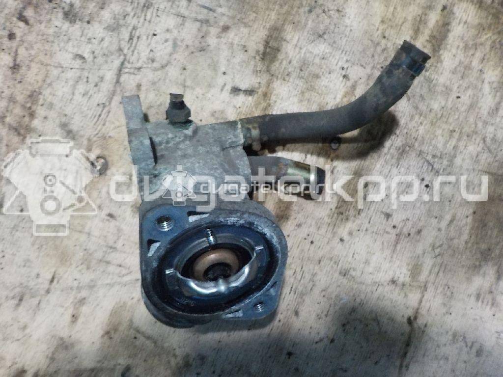 Фото Корпус термостата для двигателя 4G63 (DOHC 16V) для Mitsubishi Santamo / Lancer / Galant / Space / Outlander 106-150 л.с 16V 2.0 л бензин {forloop.counter}}