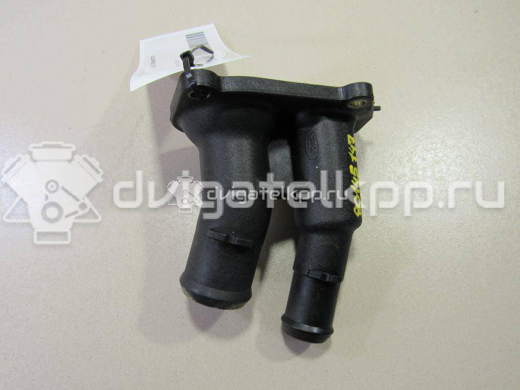 Фото Крышка термостата для двигателя IQDB для Ford Focus / C-Max / Grand 105 л.с 16V 1.6 л бензин 1707050 {forloop.counter}}