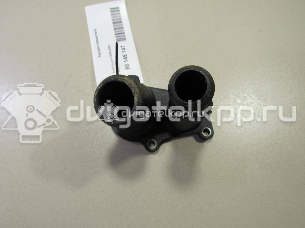 Фото Крышка термостата для двигателя IQDB для Ford Focus / C-Max / Grand 105 л.с 16V 1.6 л бензин 1707050 {forloop.counter}}