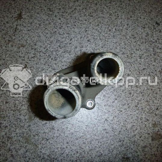 Фото Крышка термостата для двигателя IQDB для Ford Focus / C-Max / Grand 105 л.с 16V 1.6 л бензин 1707050