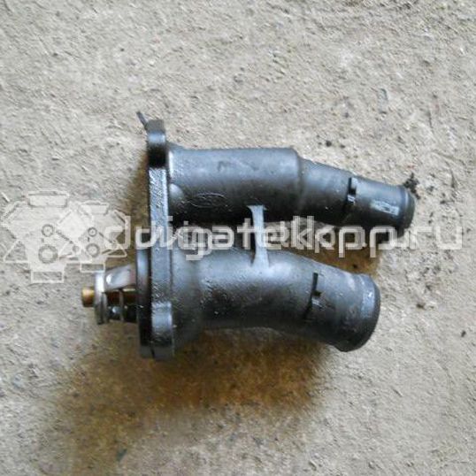 Фото Крышка термостата для двигателя IQDB для Ford Focus / C-Max / Grand 105 л.с 16V 1.6 л бензин 1707050