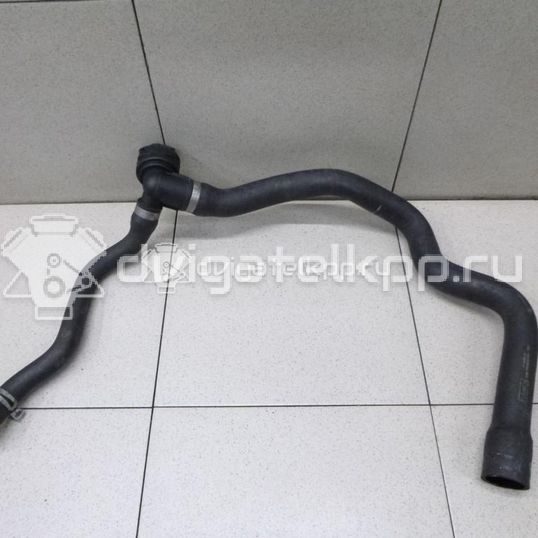 Фото Патрубок радиатора  1495275 для Ford Kuga