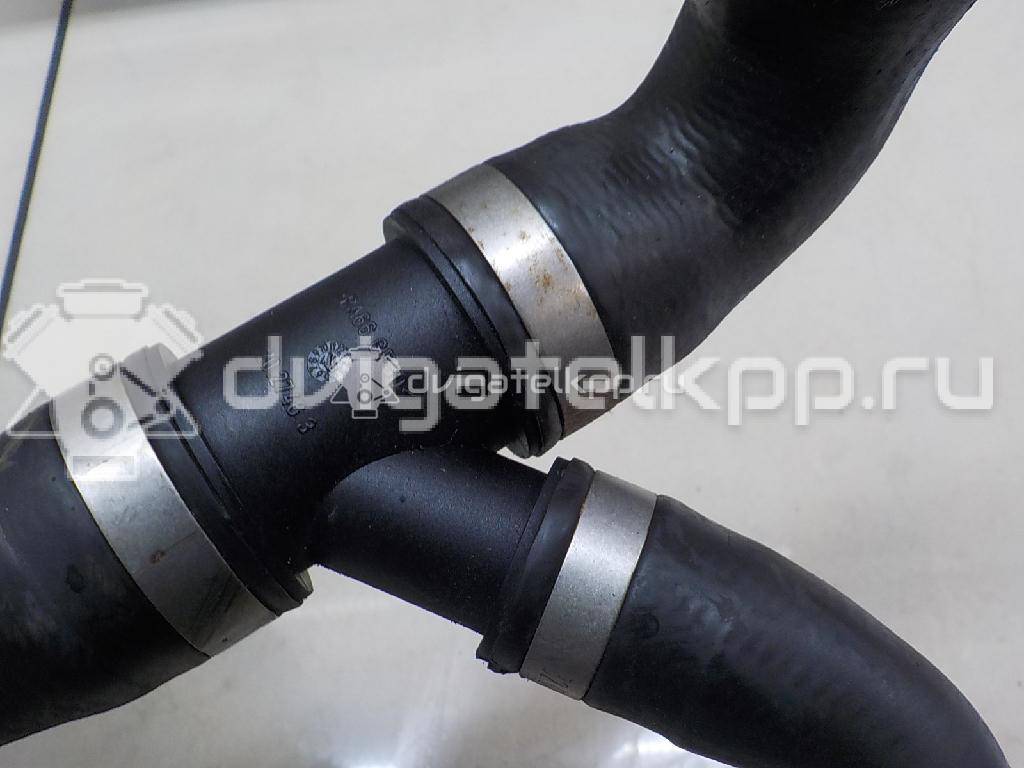 Фото Патрубок радиатора  1904762 для Ford Kuga {forloop.counter}}