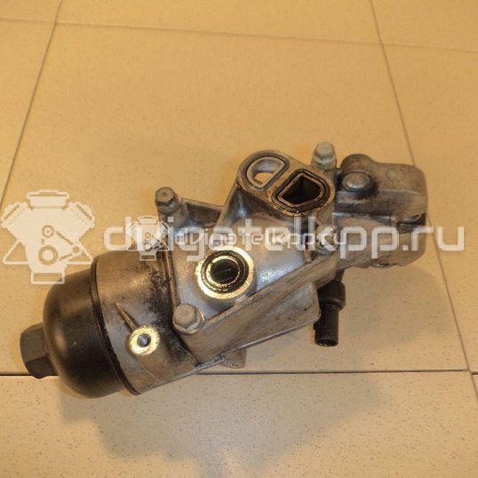 Фото Корпус масляного фильтра для двигателя D4FB для Hyundai / Kia 90-136 л.с 16V 1.6 л Дизельное топливо S263102A002