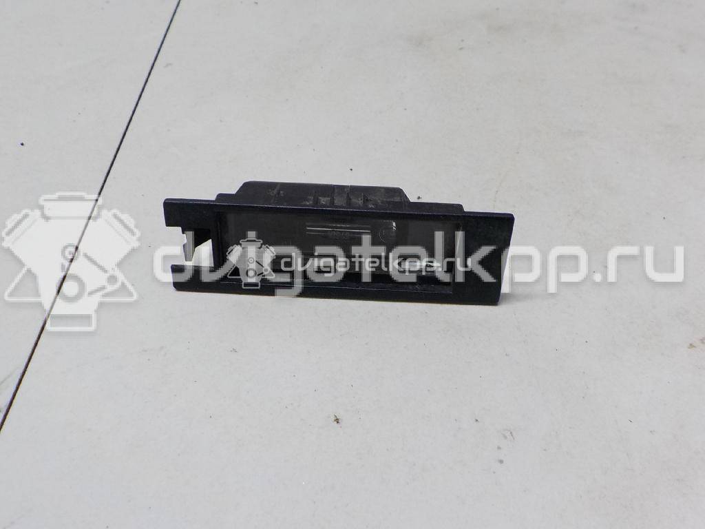 Фото Фонарь подсветки номера  09164143 для opel Zafira B {forloop.counter}}