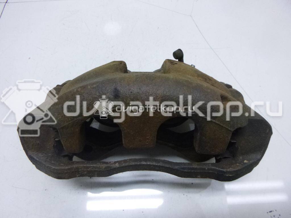 Фото Суппорт тормозной передний левый  6C112B121AD для Ford Tourneo / Transit {forloop.counter}}