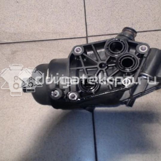 Фото Корпус масляного фильтра для двигателя D4FB для Hyundai / Kia 90-136 л.с 16V 1.6 л Дизельное топливо 263102A510