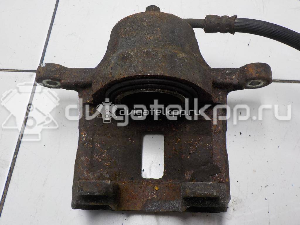 Фото Суппорт тормозной передний правый  581301G100 для Hyundai Accent {forloop.counter}}