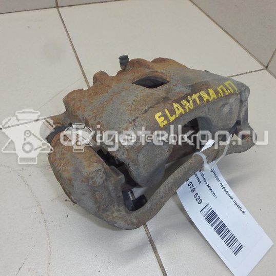 Фото Суппорт тормозной передний правый  581302H500 для Hyundai Elantra