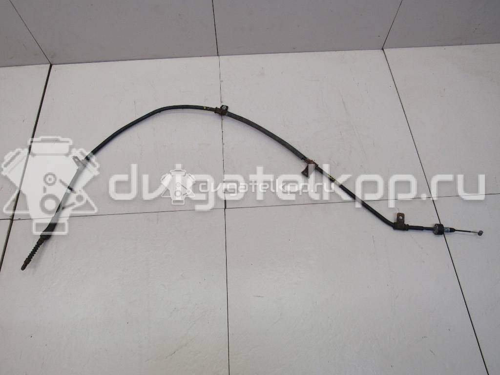 Фото Трос стояночного тормоза правый  597702H300 для Hyundai I30 / Elantra {forloop.counter}}