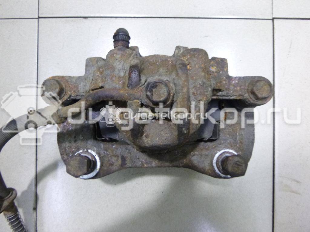 Фото Суппорт тормозной передний левый  581101J100 для Hyundai I20 {forloop.counter}}