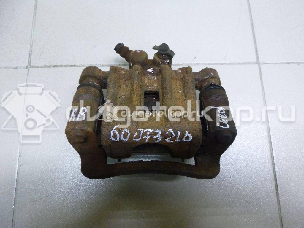 Фото Суппорт тормозной задний правый  582301H300 для Hyundai I30 {forloop.counter}}