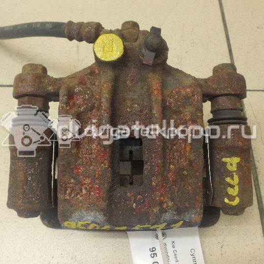 Фото Суппорт тормозной задний правый  582301H300 для Hyundai I30