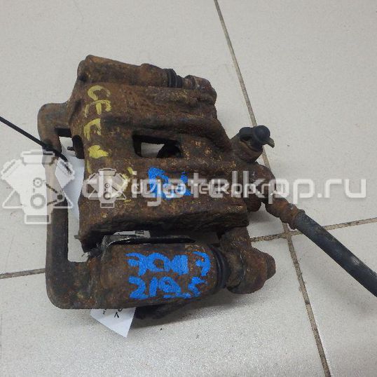 Фото Суппорт тормозной задний левый  582101H300 для Hyundai I30