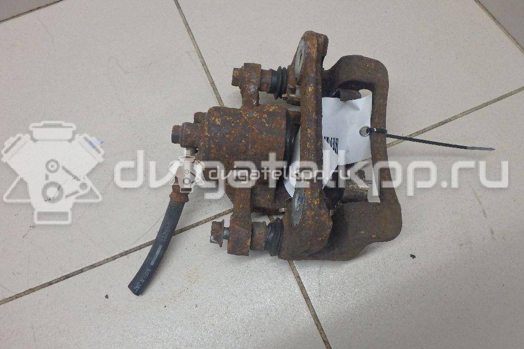 Фото Суппорт тормозной задний левый  582101H300 для Hyundai I30 {forloop.counter}}