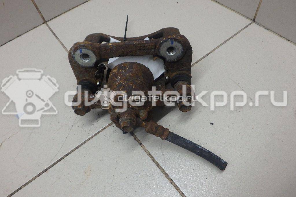 Фото Суппорт тормозной задний левый  582101H300 для Hyundai I30 {forloop.counter}}