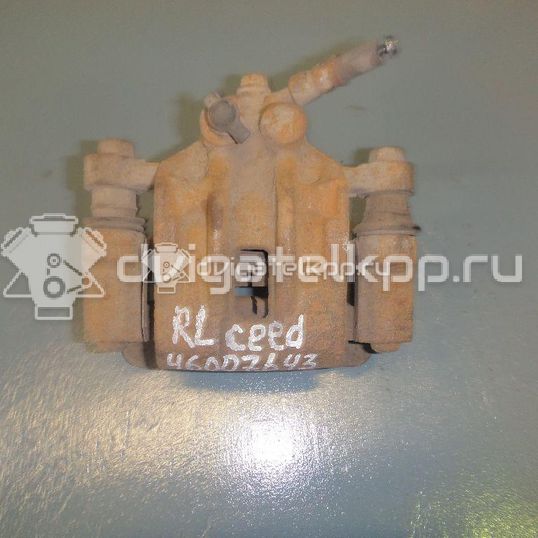 Фото Суппорт тормозной задний левый  582101H300 для Hyundai I30