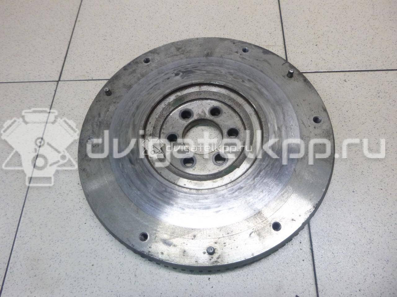 Фото Маховик для двигателя QG16DE для Nissan Sunny / Bluebird / Avenir / Primera / Almera 102-120 л.с 16V 1.6 л бензин 123109F700 {forloop.counter}}