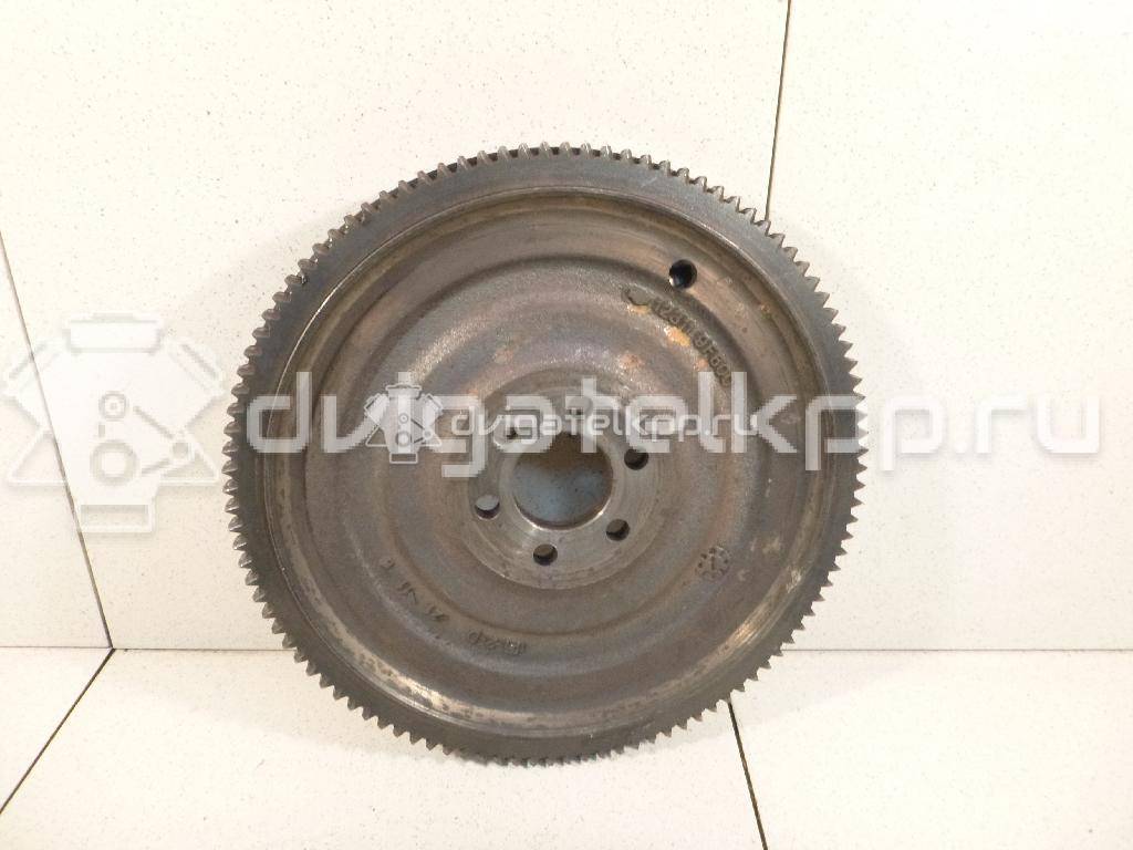 Фото Маховик для двигателя QG16DE для Nissan Sunny / Bluebird / Avenir / Primera / Almera 102-120 л.с 16V 1.6 л бензин 123109F700 {forloop.counter}}